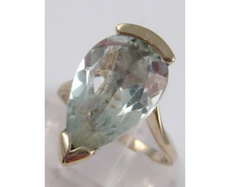 A white metal (tests 18 carat gold) pear shape aquamarine ring, aquamarine approx. 10x18mm,  estimated to weigh in the region