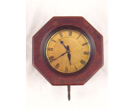 An unusual nickel plated brass alarm clock in octagonal mahogany case, the hinge marked P M & Co patent, with lock and key, t