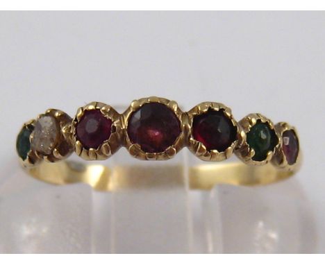 A Victorian “regards” ring (sapphire replaced with an emerald), 3.5mm wide, size K, 1.1 gms.
