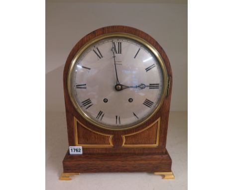 An early 20th century oak bracket clock with an eight day Ting Tang striking movement by W & H SCH dial signed FATTORINI, HAR