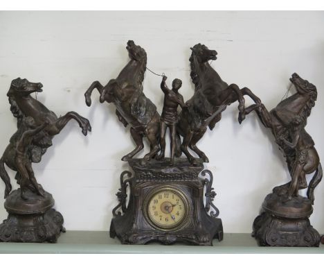 A Spelter metal - Marley Horses - clock garniture - Height 44cm 