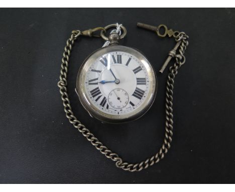 A silver cased open faced pocket watch with import marks to case, white enamel dial with Roman numerals and subsidiary second