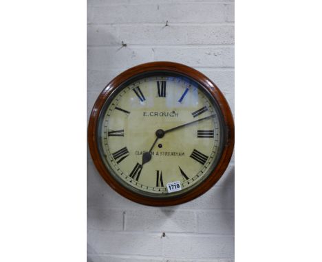 A late 19th century 12" dial wall clock with a mahogany surround eight day fusee chain drive movement - E. Crouch, London 
Co