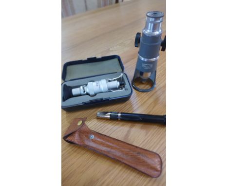A collection of three portable microscopes to include an Engis stand 50X measuring microscope of very high laboratory standar