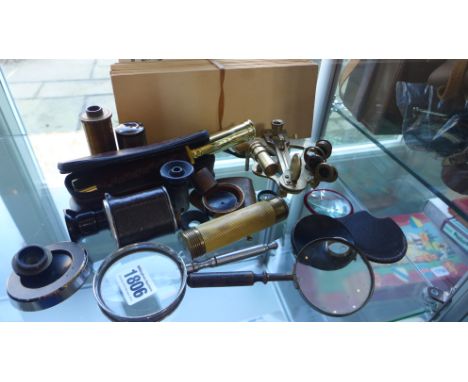 A selection of Microscope accessories and other optical items including a Monocular by Goerz of Berlin, various magnifying gl
