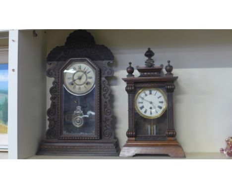 An early 20th century oak Ansonia mantel gingerbread style clock having printed dial with split chapter ring striking on a go