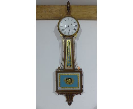 A good 20th century quality weight driven wall clock with a circular 18cm dial with a brass bezel and etched glass front 104c