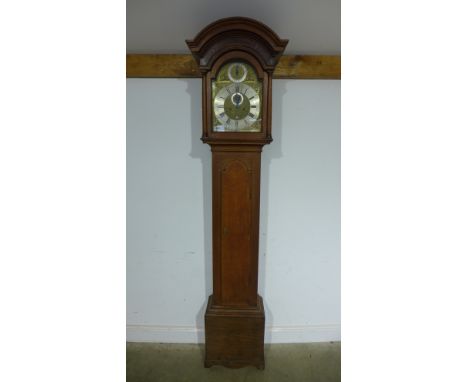 An oak long case eight day clock with brass 12" arched dial, subsidiary second dial and date signed John Wood - worked in Gra
