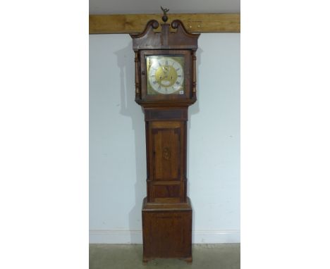 An 8 day longcase clock with a 30cm brass dial with a seconds hand, a plaque for Tho's Wightman London and a good quality mov