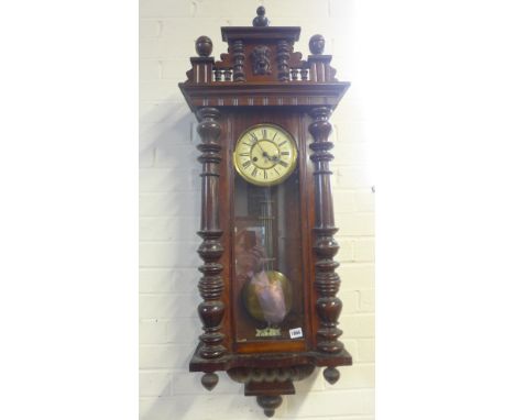 A walnut Vienna style wall clock with a Gustav Becker striking movement - Height 116cm 
