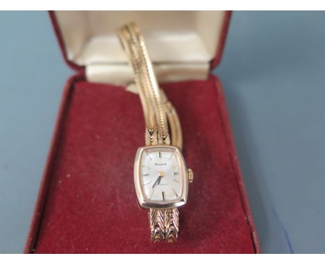 A 9ct yellow gold cased Ladies Accurist wristwatch with silvered dial and gold coloured batons - Total weight approx. 21 gms 