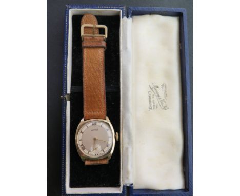 A 1960 Vertex 9ct gold Gentleman's wristwatch having cushion shaped case with circular dial having Roman numerals and seconds