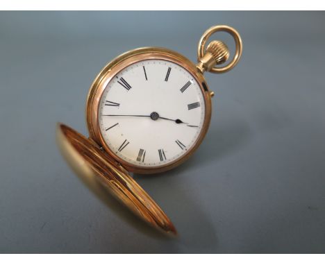 An 18ct yellow gold cased Hunter full pocket watch with white enamelled dial, Roman numerals to chapter ring, engraved to mov