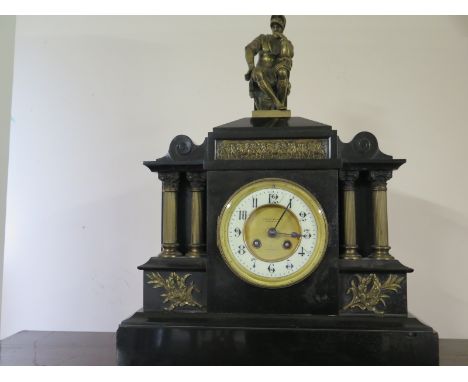 A Victorian black slate wall clock surmounted by a classical figure with a Japy and Co movement 
Condition report: Missing pe