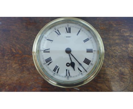 A solid brass Ships clock with good quality English movement - Diameter 17.5cm 