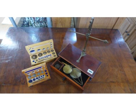 A set of Avery of Birmingham patent brass apothecary beam balance weighing scales  complete with mahogany box and two boxes o