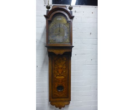 An 18th century Dutch marquetry wall clock with later English mechanism, brass carved Bezel and circular dial with Roman nume