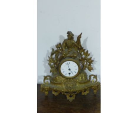 A gilt metal figural mantel clock - Height 32cm 