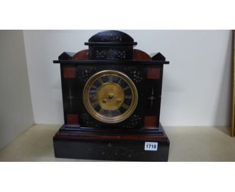 A late 19th century black and rouge marble mantel clock, gilt highlighted 4" Roman dial, strike on bell
Condition report: Wor