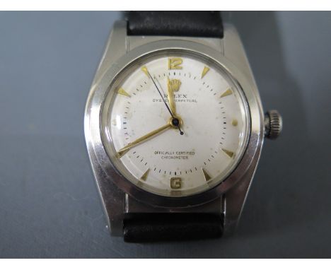 A stainless steel cased Gentleman's Rolex Oyster Perpetual - Bubble Back - chronometer wristwatch, silvered dial with gold co