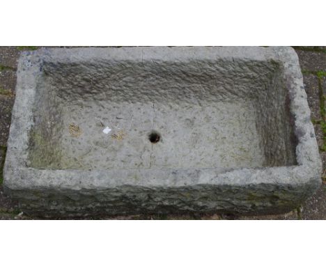 A Derbyshire grit stone trough, 79cm wide