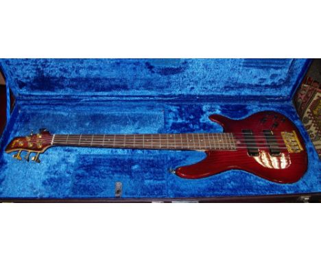 A Yamaha 7RB 5-string bass electric guitar, in faux mahogany, cased, c.1980