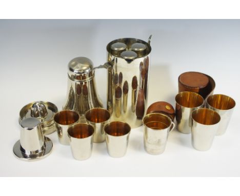 A 20th century E.P.N.S.  travelling cocktail shaker, with three flasks, juice squeezer, four stirrup cups and strainers, 29cm