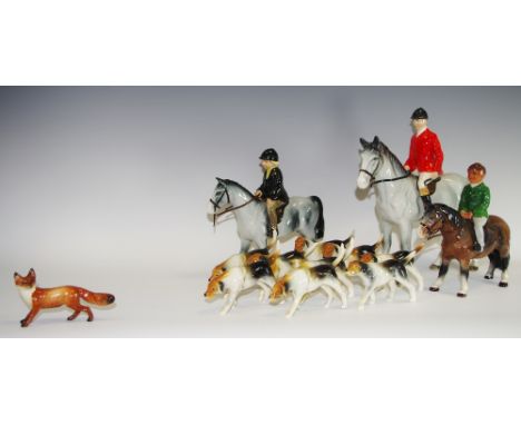 A Bretby Hunting group, with huntsman on a grey horse, girl on a grey, boy on a bay,   eight Bretby hounds, various poses;  a