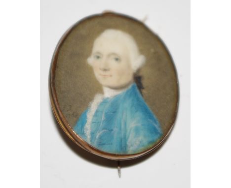 English School, mid 18th century, portrait of a wigged gentleman, signed with initials and dated 1768, miniature on ivory, 3.