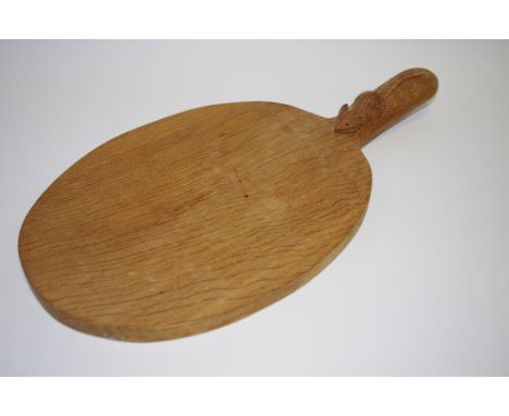 Robert Thompson, Mouseman of Kilburn - an oak cheese board, carved mouse signature,  38.5cm long