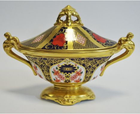 A Royal Crown Derby Imari 1128 pattern twin-handled oval navette urn and cover, 14cm high, printed mark (second)