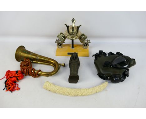 Lot to include a brass bugle, martial arts trophy, Egyptian style sarcophagus model, faux carved tusk model and other. [W]