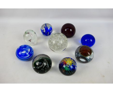 A collection of paperweights to include Caithness and other. [W]