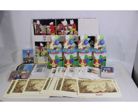 Rupert The Bear - A collection of Rupert The Bear items - Lot includes 4 x boxed Rupert The Bear ceramic money banks. A large