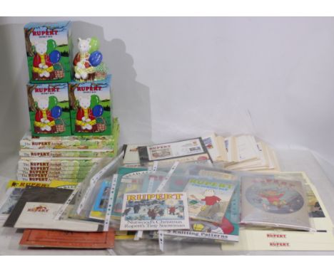 Rupert The Bear - A collection of Rupert The Bear items - Lot includes 9 x Rupert The Bear 1998 annuals. 3 x boxed Rupert cer