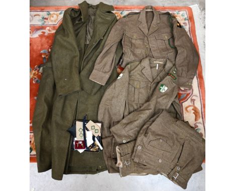Vintage uniform for a captain in the Royal Army Dental Corps, comprising Great Coat Dismounted 1940 pattern size 9 (1946), tw