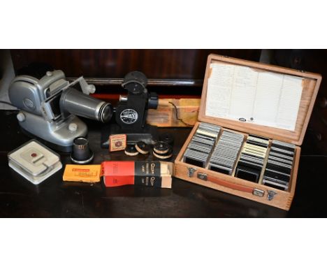 A vintage Noris Plank slide projector kit to/w a 'Ray' cine projector and reels (2) 