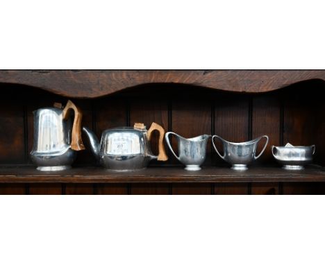 Five pieces of Picquot Ware aluminium alloy tea wares, including tea pot, hot water jug, milk and sugar pair and a single sug