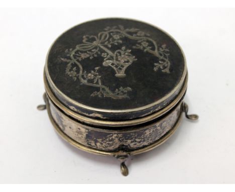 A hallmarked silver and tortoise shell trinket box. Diam. 7.5cm
