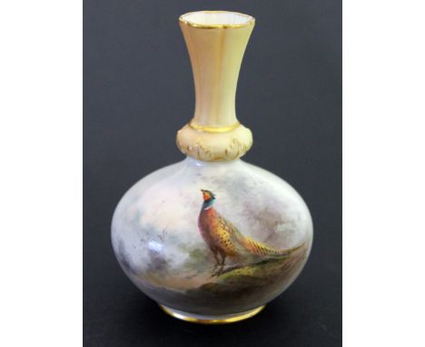 A Royal Worcester porcelain vase with hand painted decoration of a pheasant signed Jas Stinton, the base numbered 799/G. H12.