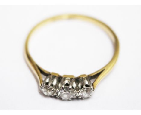 An 18ct gold and platinum diamond ring. Wt. 2g Size N