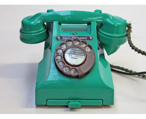 A green plastic vintage telephone, the base numbered 312F S55/3A and the handset 164 55. Condition - appears good, two minor 