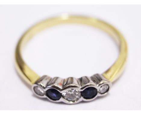 An 18ct gold diamond sapphire ring. Gross wt. 3.7g Size P