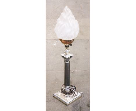 A silver plated Corinthian column table lamp with pressed glass shade. H75cm