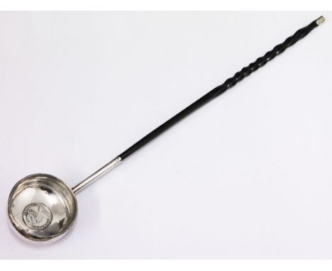 A silver and horn toddy ladle with a queen Ann coin inset in bowl. L34cm