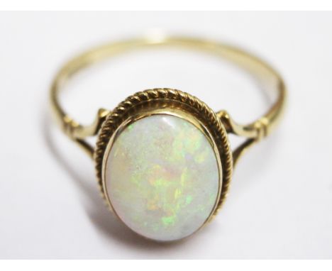 A 9ct gold opal ring. Wt. 2g Size P