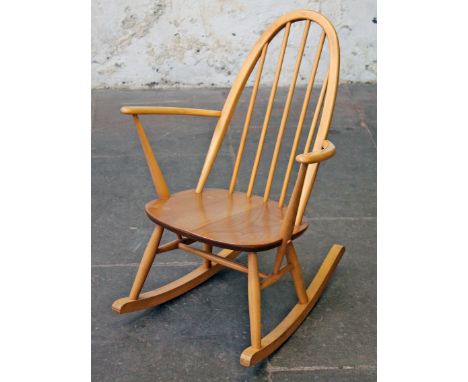 An Ercol light elm and beech rocking chair. H85cm
