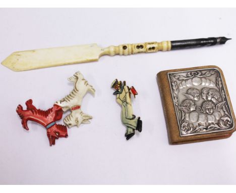 A mixed lot comprising two vintage brooches, a silver mounted marriage service and a bone Stanhope pen