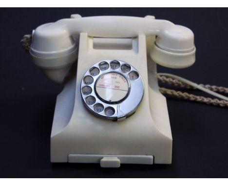 A cream plastic vintage telephone, the handset numbered G.P.O. PL 37/234 No164. Condition - general wear to include crazing, 
