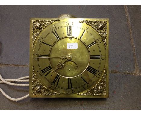 A brass long case clock movement and dial inscribed 'Hampson Wrexham'. 28.5cm x 28.5cm